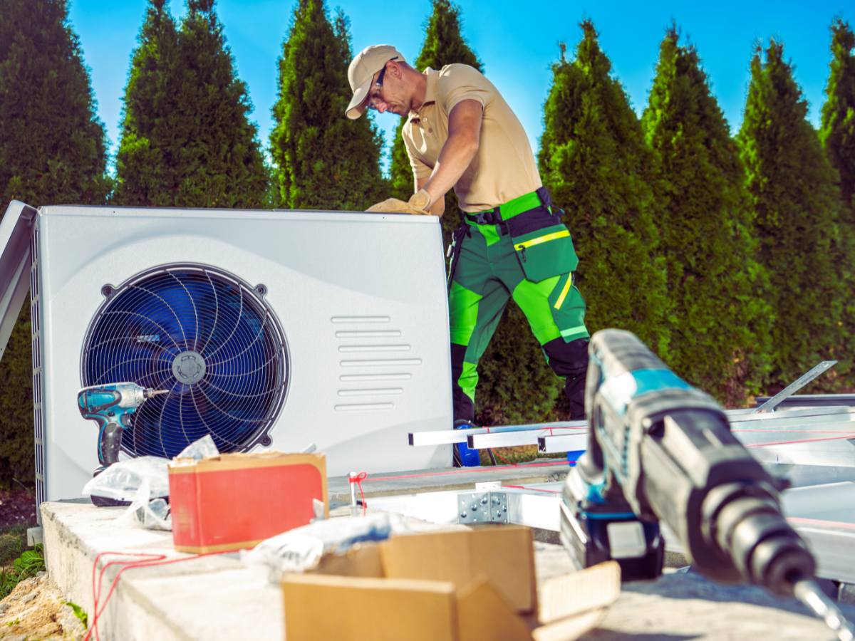 HVAC tech working on heat pump that won't turn on
